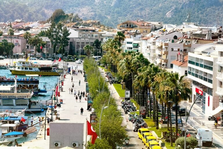 Boats and waterfront buildings at a marina in Marmaris, Turkey
