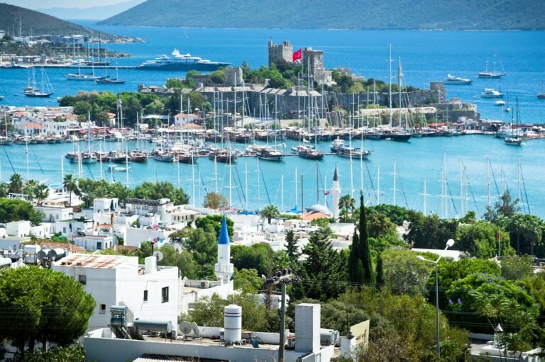 Bodrum Castle and harbour surrounded by sailing boats and white buildings